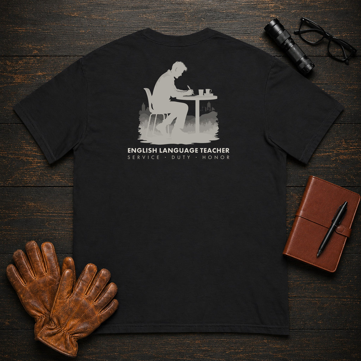 English Language Teacher T-Shirt | Standard Back Print | Marking a page (Male) — Black