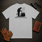 Greenhouse Specialist T-Shirt | Standard Back Print | Inspecting Leaves (Male) — Granite