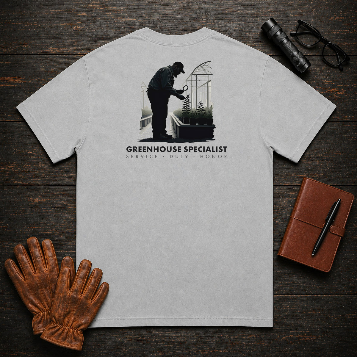 Greenhouse Specialist T-Shirt | Standard Back Print | Inspecting Leaves (Male) — Granite