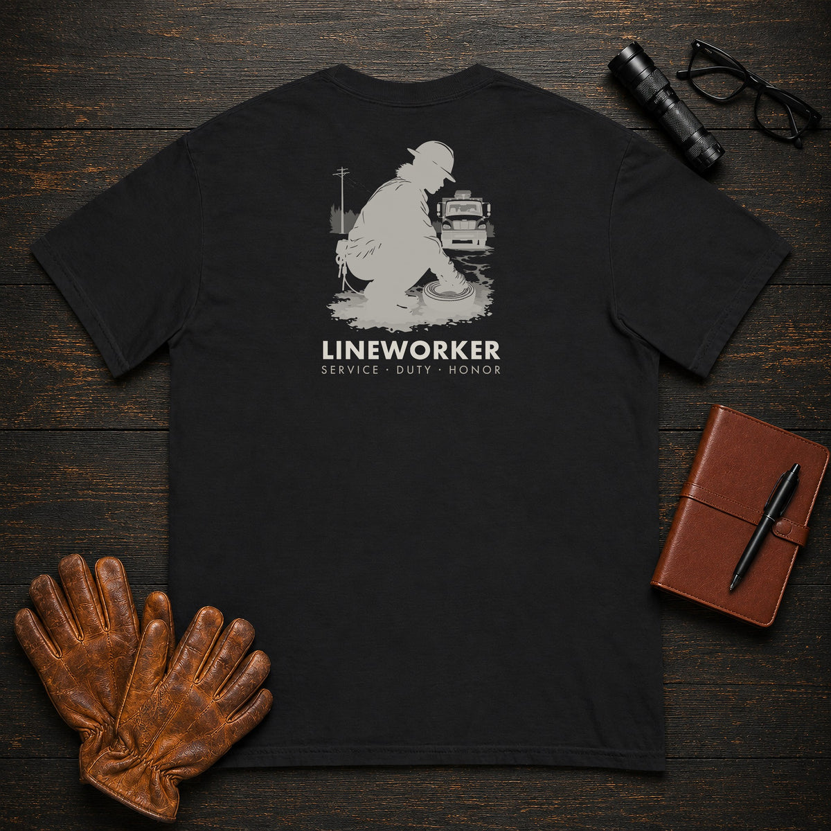 Lineworker T-Shirt | Standard Back Print | Preparing the Tools (Female) — Black