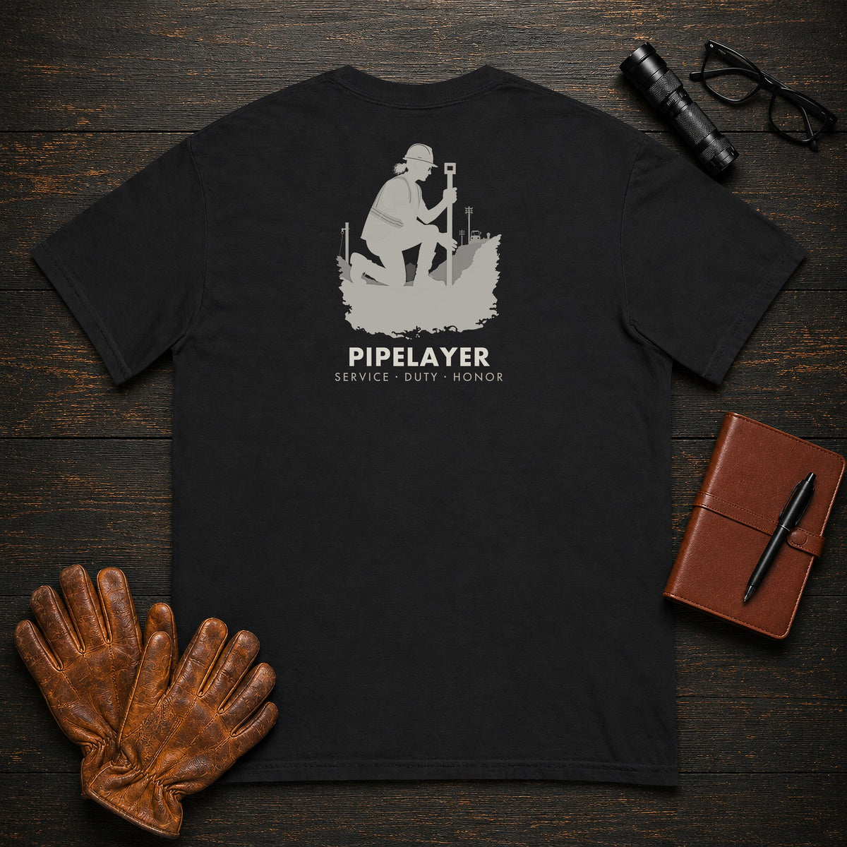 Pipelayer T-Shirt | Standard Back Print | Checking the Grade (Female) — Black