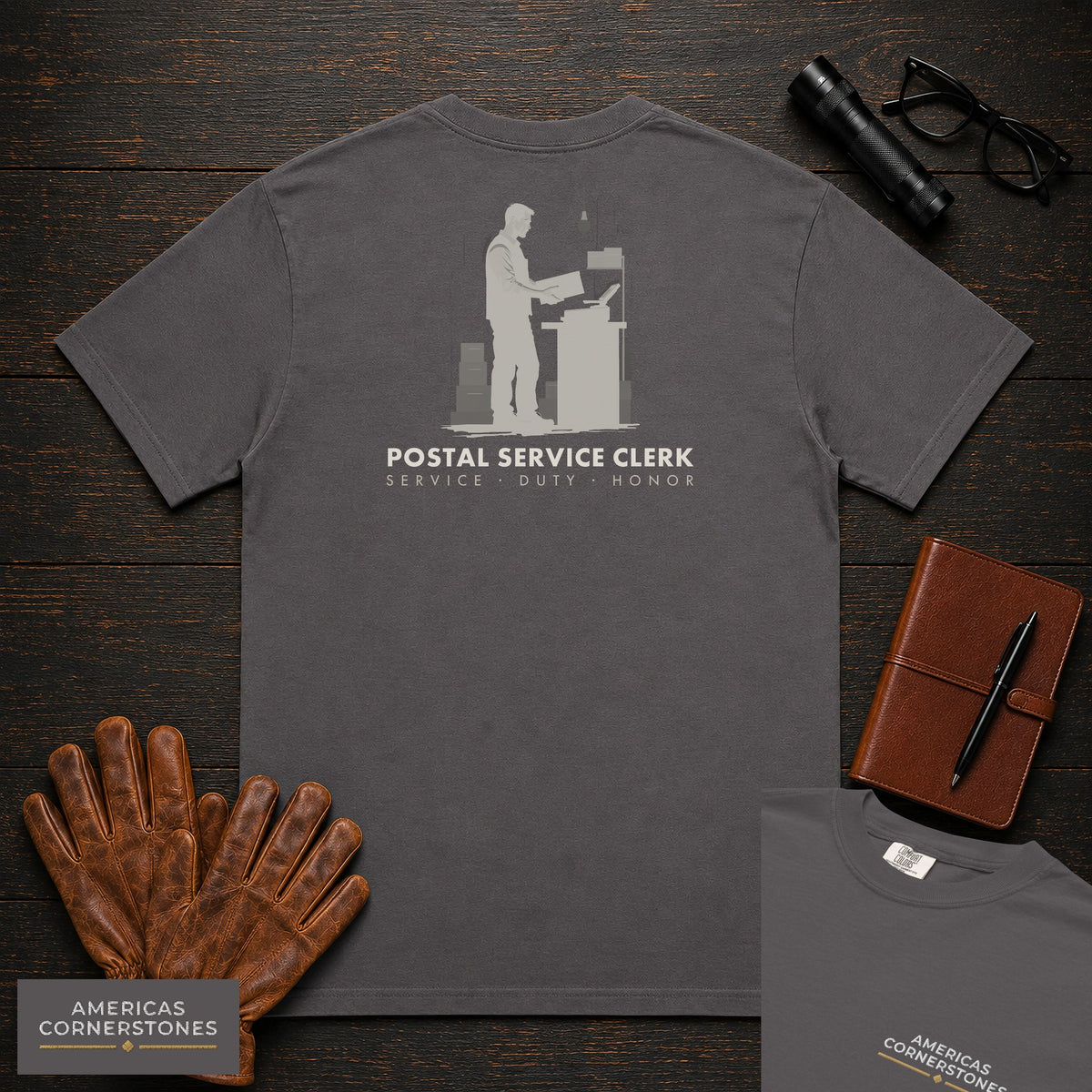 Postal Service Clerk embroidered t-shirt in Graphite, Weighing a Parcel (Male)