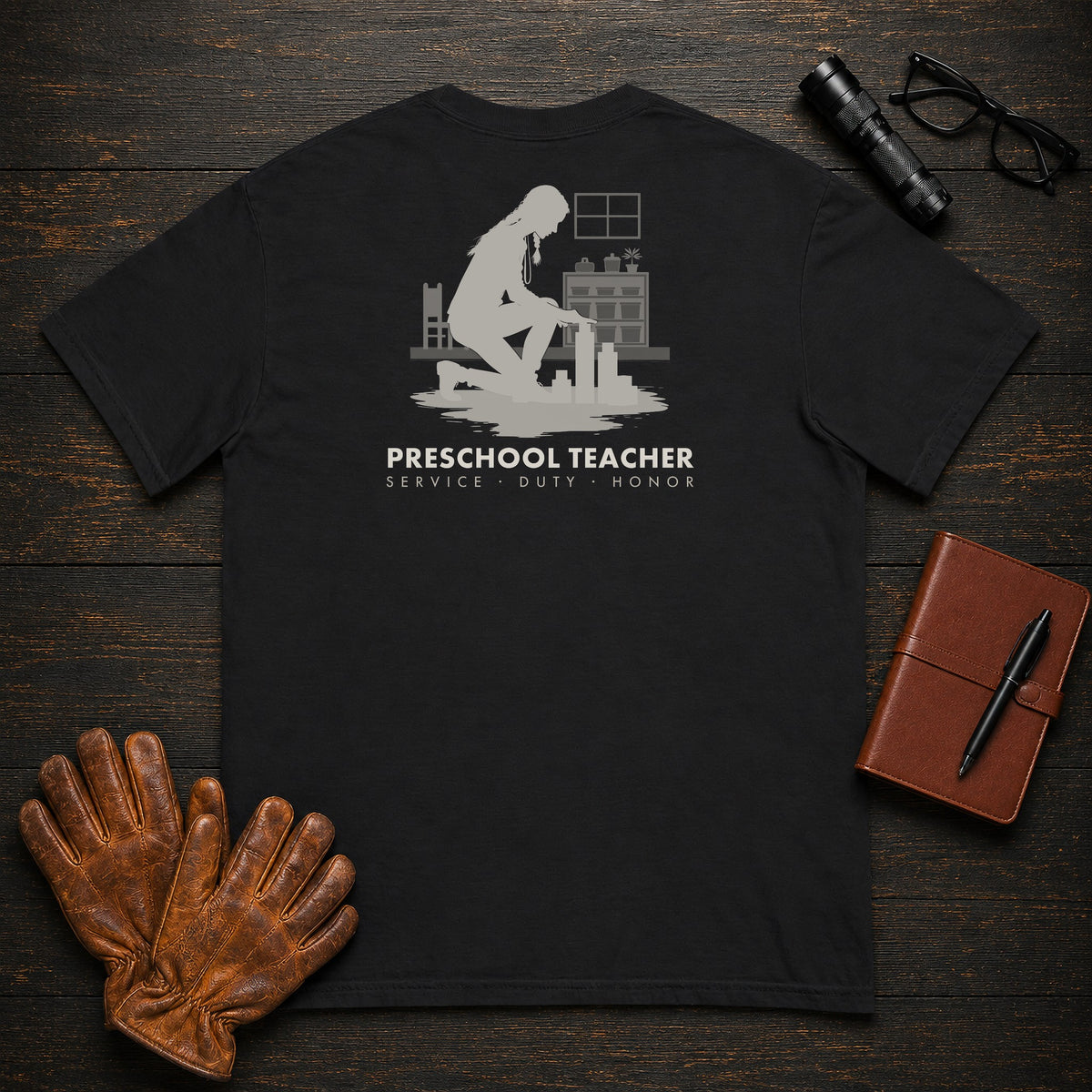 Preschool Teacher t-shirt in Black, Building with blocks (Female)
