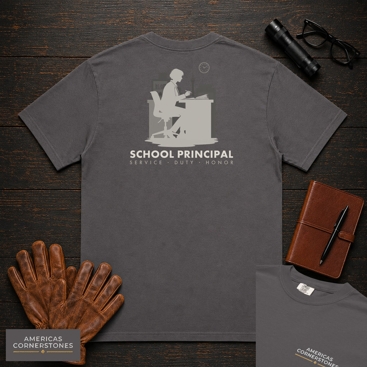 School Principal embroidered t-shirt in Graphite, Reviewing at desk (Female)