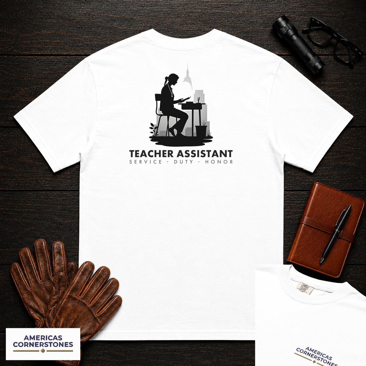 Teacher Assistant embroidered t-shirt in White, Reading beside desk (Female)